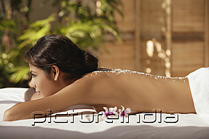 PictureIndia - A woman relaxes at a spa