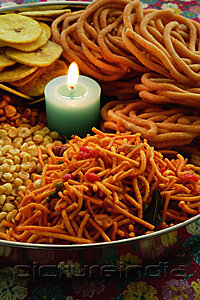 PictureIndia - A mixed snack platter with a candle