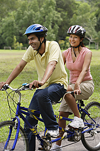 PictureIndia - A couple ride a bike together