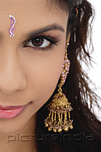 PictureIndia - Cropped face of young woman with a bindi