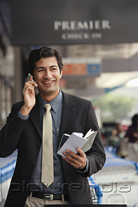 PictureIndia - Man talking on the phone