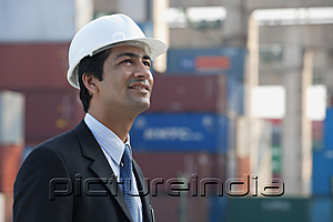 PictureIndia - Man with helmet looking up