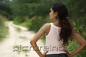 PictureIndia - Young woman looking into distance