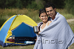 PictureIndia - Young couple camping in the wilderness