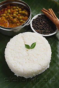 PictureIndia - Still life of mixed vegetable curry and basmati rice
